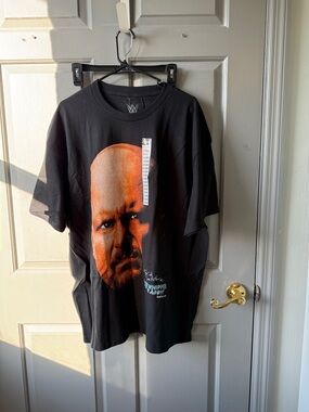 WWE Black Short-Sleeve Tee with Bold Orange Face Graphic